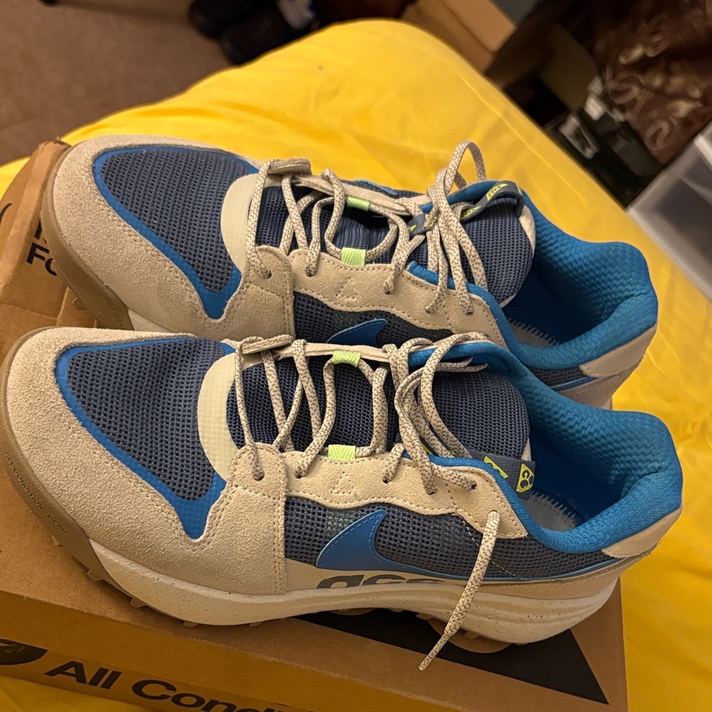 On Running Blue and Tan Athletic Shoes